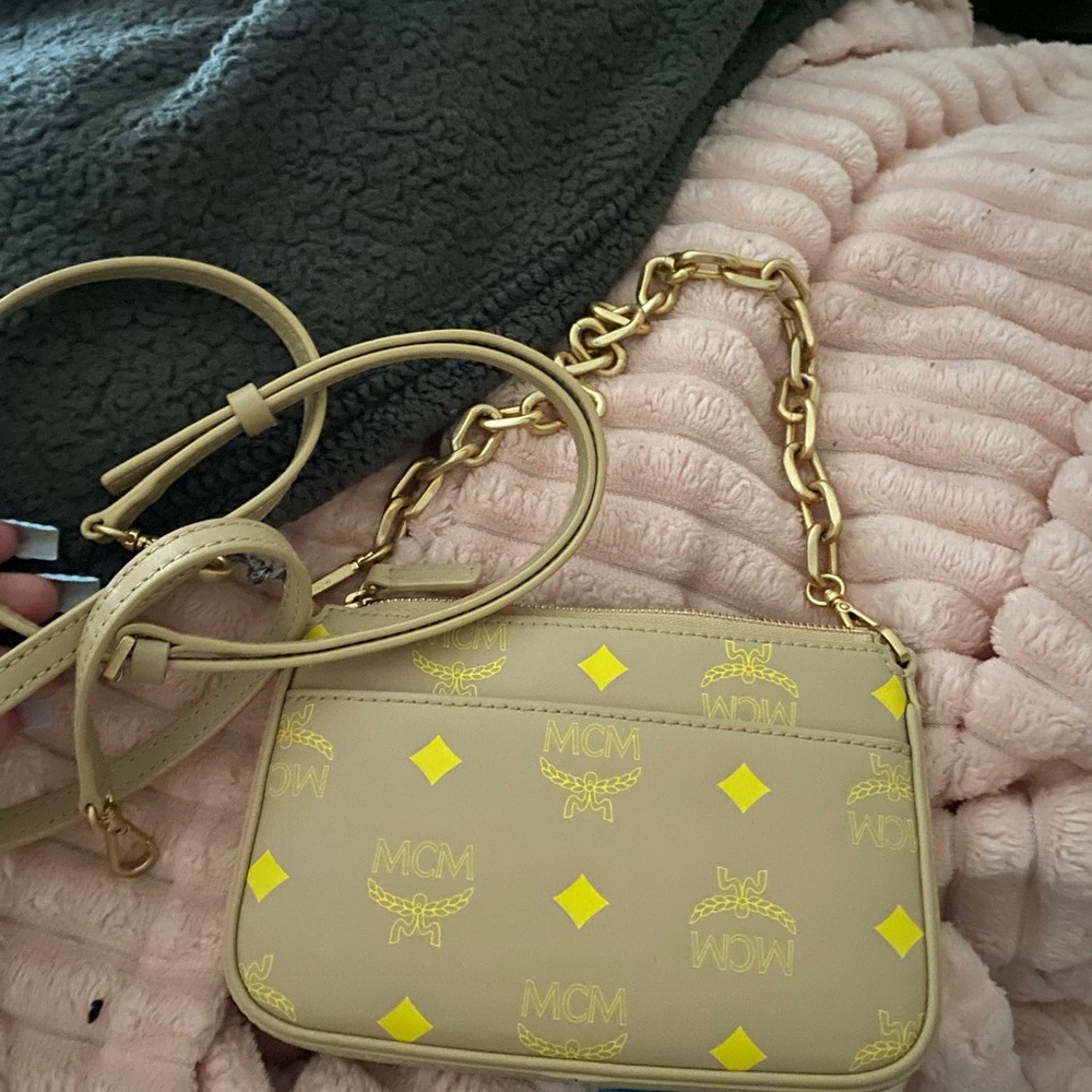 Tan and yellow mcm purse